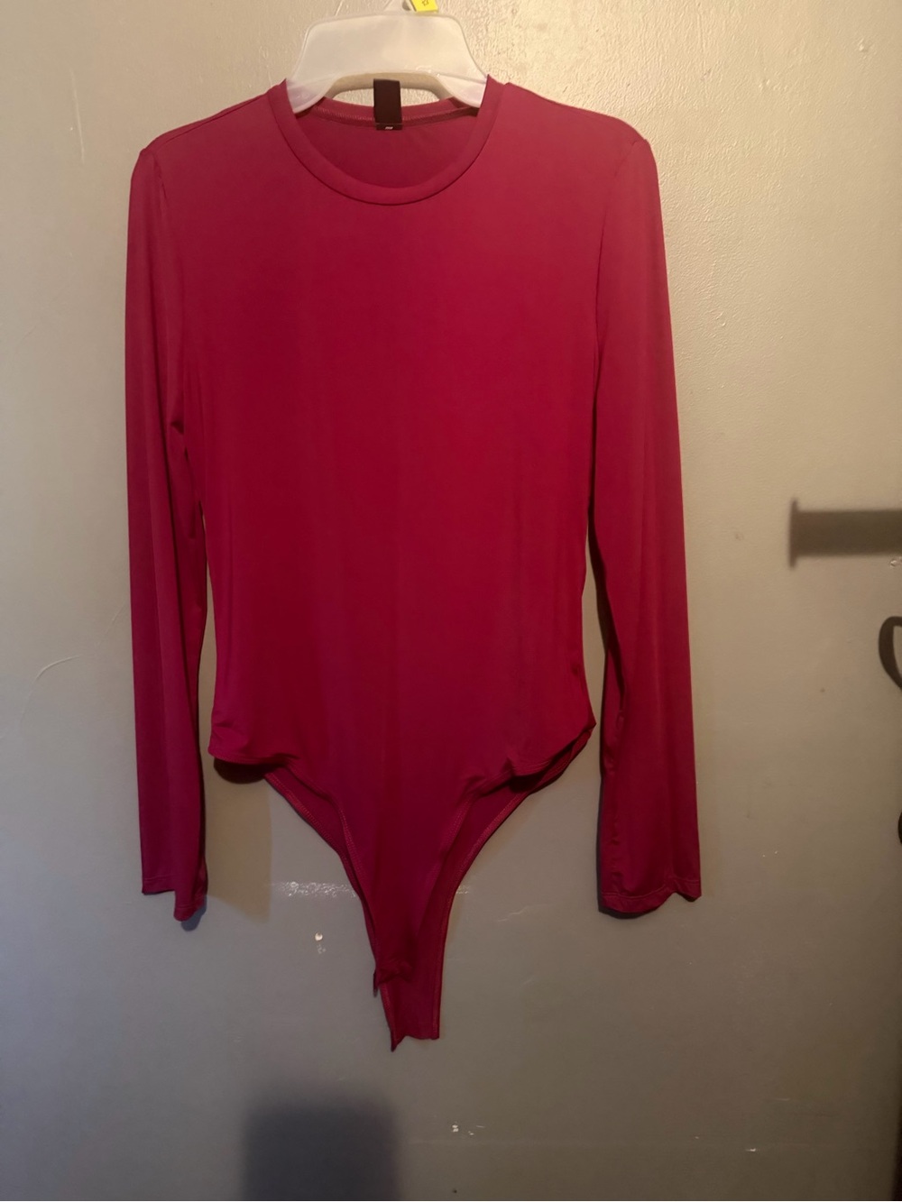 SHEIN Long Sleeve One-Piece Bodysuit in Fuchsia Pink